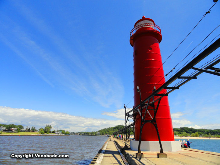 fishing from the lighthouse connector park pier grand haven